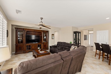 Perched on an elevated 7,841 sq. ft. lot overlooking the 9th on Golf Club At La Quinta in California - for sale on GolfHomes.com, golf home, golf lot