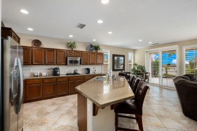 Perched on an elevated 7,841 sq. ft. lot overlooking the 9th on Golf Club At La Quinta in California - for sale on GolfHomes.com, golf home, golf lot