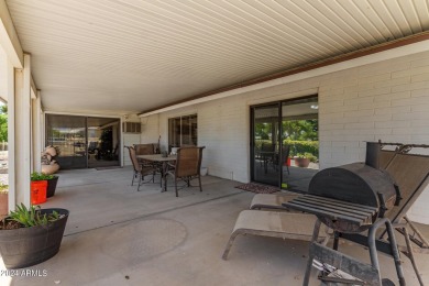 Enjoy the best of active adult living in this charming 3-bedroom on Sun City Country Club in Arizona - for sale on GolfHomes.com, golf home, golf lot