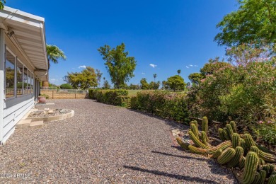 Enjoy the best of active adult living in this charming 3-bedroom on Sun City Country Club in Arizona - for sale on GolfHomes.com, golf home, golf lot