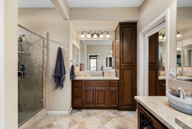 Perched on an elevated 7,841 sq. ft. lot overlooking the 9th on Golf Club At La Quinta in California - for sale on GolfHomes.com, golf home, golf lot