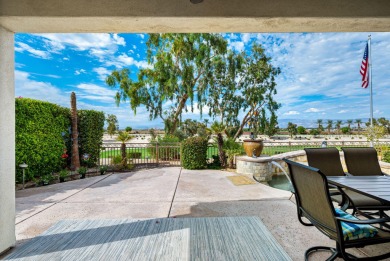 Perched on an elevated 7,841 sq. ft. lot overlooking the 9th on Golf Club At La Quinta in California - for sale on GolfHomes.com, golf home, golf lot