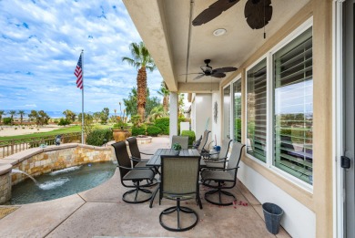 Perched on an elevated 7,841 sq. ft. lot overlooking the 9th on Golf Club At La Quinta in California - for sale on GolfHomes.com, golf home, golf lot