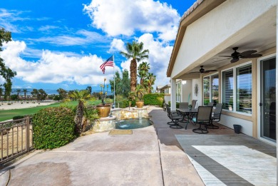 Perched on an elevated 7,841 sq. ft. lot overlooking the 9th on Golf Club At La Quinta in California - for sale on GolfHomes.com, golf home, golf lot