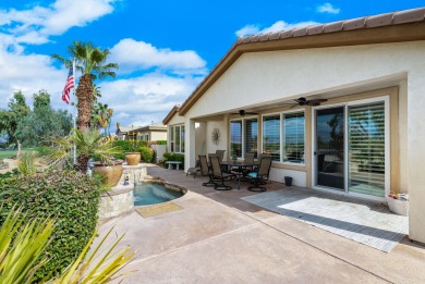 Perched on an elevated 7,841 sq. ft. lot overlooking the 9th on Golf Club At La Quinta in California - for sale on GolfHomes.com, golf home, golf lot