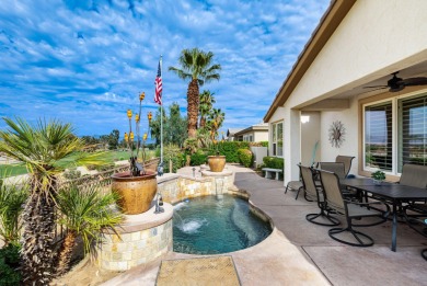 Perched on an elevated 7,841 sq. ft. lot overlooking the 9th on Golf Club At La Quinta in California - for sale on GolfHomes.com, golf home, golf lot