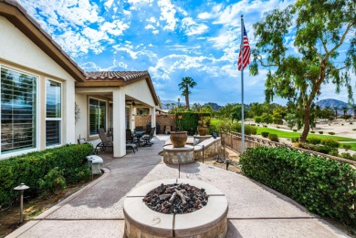 Perched on an elevated 7,841 sq. ft. lot overlooking the 9th on Golf Club At La Quinta in California - for sale on GolfHomes.com, golf home, golf lot