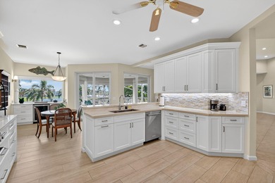 Gorgeous, sweeping  views of golf course and lake from on Atlantis Golf Club in Florida - for sale on GolfHomes.com, golf home, golf lot