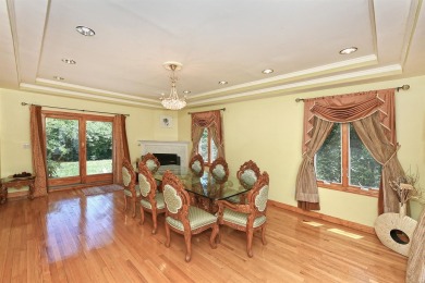 Elegant Colonial tucked away on a quiet cul-de-sac, this on Garden City Golf Club in New York - for sale on GolfHomes.com, golf home, golf lot