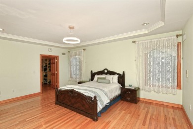 Elegant Colonial tucked away on a quiet cul-de-sac, this on Garden City Golf Club in New York - for sale on GolfHomes.com, golf home, golf lot