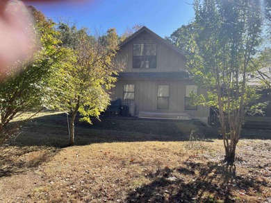 Charming 4-Bedroom home. Nestled in a serene and picturesque on Mountain Ranch Golf Club in Arkansas - for sale on GolfHomes.com, golf home, golf lot