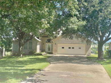 This Meadowlakes home is situated on the Hidden Falls Golf on Hidden Falls Golf Club in Texas - for sale on GolfHomes.com, golf home, golf lot