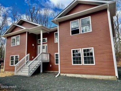 Step into this stunning, newly built home located in an on Lords Valley Country Club, Inc in Pennsylvania - for sale on GolfHomes.com, golf home, golf lot