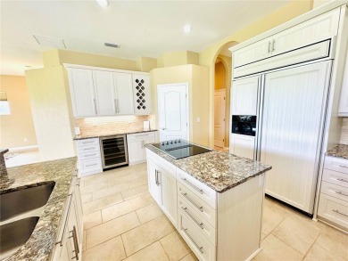 Live where luxury meets lifestyle in this stunning executive on LPGA International Golf Course in Florida - for sale on GolfHomes.com, golf home, golf lot