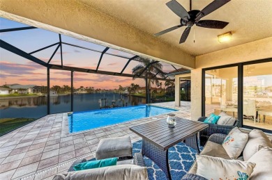 Fall in love with this 2015 built custom waterfront pool home on Saint Andrews South Golf Club in Florida - for sale on GolfHomes.com, golf home, golf lot