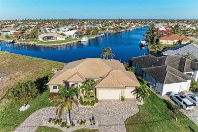 Fall in love with this 2015 built custom waterfront pool home on Saint Andrews South Golf Club in Florida - for sale on GolfHomes.com, golf home, golf lot