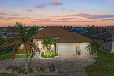 Fall in love with this 2015 built custom waterfront pool home on Saint Andrews South Golf Club in Florida - for sale on GolfHomes.com, golf home, golf lot