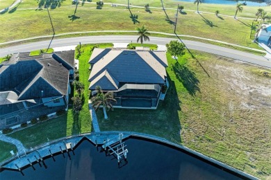 Fall in love with this 2015 built custom waterfront pool home on Saint Andrews South Golf Club in Florida - for sale on GolfHomes.com, golf home, golf lot