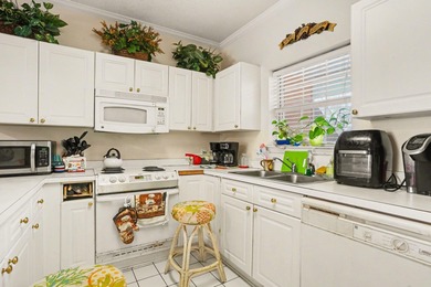 Welcome to this charming two-bedroom, two-bathroom first-floor on Myrtlewood Golf Course and Club  in South Carolina - for sale on GolfHomes.com, golf home, golf lot