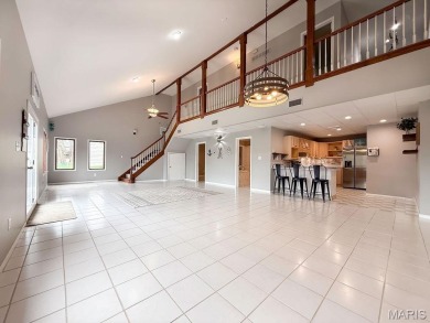 Nestled along the shoreline in a serene lake community, this on Terre Du Lac Golf and Country Club in Missouri - for sale on GolfHomes.com, golf home, golf lot