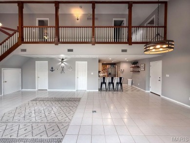 Nestled along the shoreline in a serene lake community, this on Terre Du Lac Golf and Country Club in Missouri - for sale on GolfHomes.com, golf home, golf lot