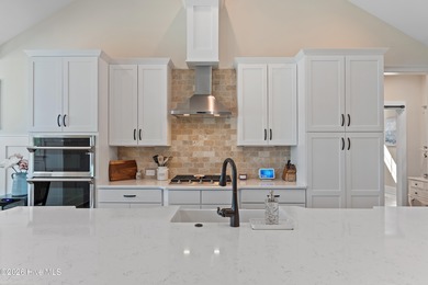 This open and airy home with golf and pond views is ready for a on Sea Trail Golf Resort in North Carolina - for sale on GolfHomes.com, golf home, golf lot