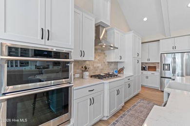 This open and airy home with golf and pond views is ready for a on Sea Trail Golf Resort in North Carolina - for sale on GolfHomes.com, golf home, golf lot