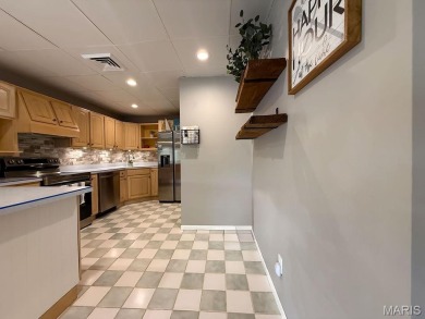Nestled along the shoreline in a serene lake community, this on Terre Du Lac Golf and Country Club in Missouri - for sale on GolfHomes.com, golf home, golf lot