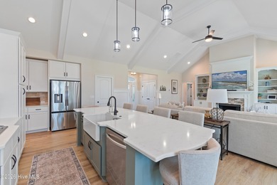 This open and airy home with golf and pond views is ready for a on Sea Trail Golf Resort in North Carolina - for sale on GolfHomes.com, golf home, golf lot