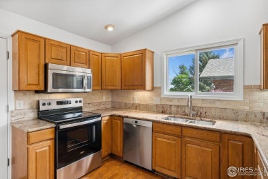 Enjoy easy living in one of Fort Collins' most distinctive on Adriel Hills Golf Course in Colorado - for sale on GolfHomes.com, golf home, golf lot