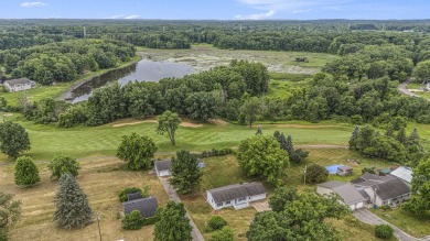 This property is a must see! Three bedroom, 2 bath, walkout on The Links of Bowen Lake in Michigan - for sale on GolfHomes.com, golf home, golf lot
