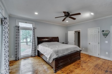 You don't want to miss this beautiful and spacious home located on Bay Pointe Golf and Resort in Mississippi - for sale on GolfHomes.com, golf home, golf lot
