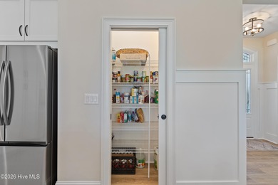 This open and airy home with golf and pond views is ready for a on Sea Trail Golf Resort in North Carolina - for sale on GolfHomes.com, golf home, golf lot