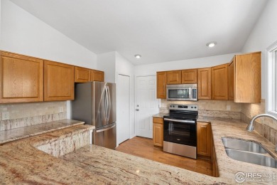 Enjoy easy living in one of Fort Collins' most distinctive on Adriel Hills Golf Course in Colorado - for sale on GolfHomes.com, golf home, golf lot