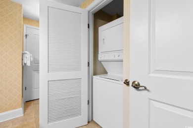 Indulge in sophisticated coastal living at this exquisite condo on Grande Dunes Golf Club in South Carolina - for sale on GolfHomes.com, golf home, golf lot