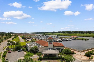 Indulge in sophisticated coastal living at this exquisite condo on Grande Dunes Golf Club in South Carolina - for sale on GolfHomes.com, golf home, golf lot