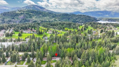 Welcome to your charming retreat nestled on a generous .40-acre on Twin Lakes Village Golf Course in Idaho - for sale on GolfHomes.com, golf home, golf lot