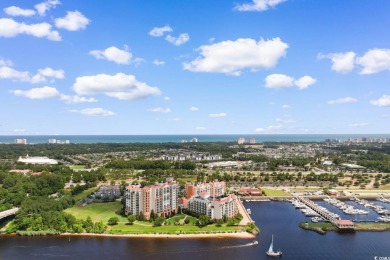 Indulge in sophisticated coastal living at this exquisite condo on Grande Dunes Golf Club in South Carolina - for sale on GolfHomes.com, golf home, golf lot