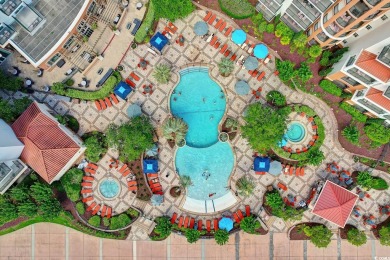 Indulge in sophisticated coastal living at this exquisite condo on Grande Dunes Golf Club in South Carolina - for sale on GolfHomes.com, golf home, golf lot