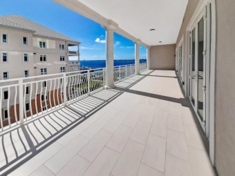 Luxury condo unit with golf course and water view in the modern on Ocean Club Golf Course / Paradise Island Golf Course in Bahamas - for sale on GolfHomes.com, golf home, golf lot