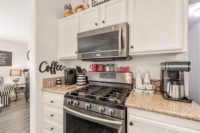 Located within the gated 55+ community of Suncrest Country Club on Suncrest Country Club in California - for sale on GolfHomes.com, golf home, golf lot