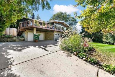 Take in sweeping views of the MN River Valley, Mpls skyline, and on Lost Spur Golf Course in Minnesota - for sale on GolfHomes.com, golf home, golf lot