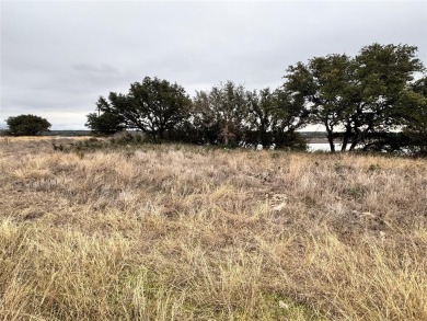 This .72 acre, waterfront lot on Lake Brownwood is ready for on Hideout Golf Club and Resort  in Texas - for sale on GolfHomes.com, golf home, golf lot