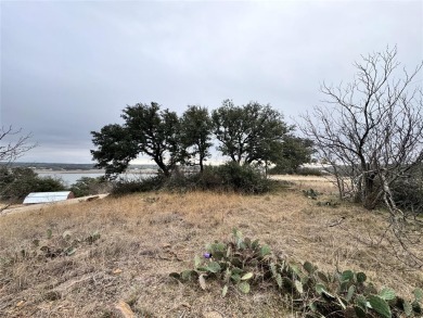 This .72 acre, waterfront lot on Lake Brownwood is ready for on Hideout Golf Club and Resort  in Texas - for sale on GolfHomes.com, golf home, golf lot