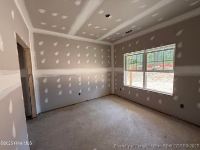 Now available and nearing completion, the 'Emeline' single level on Foxfire Golf and Country Club in North Carolina - for sale on GolfHomes.com, golf home, golf lot