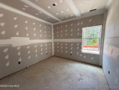 Now available and nearing completion, the 'Emeline' single level on Foxfire Golf and Country Club in North Carolina - for sale on GolfHomes.com, golf home, golf lot