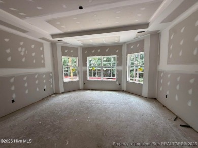 Now available and nearing completion, the 'Emeline' single level on Foxfire Golf and Country Club in North Carolina - for sale on GolfHomes.com, golf home, golf lot