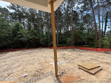 Now available and nearing completion, the 'Emeline' single level on Foxfire Golf and Country Club in North Carolina - for sale on GolfHomes.com, golf home, golf lot