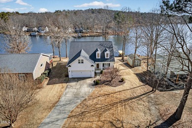 Wake up to breathtaking panoramic lake views from this on River Golf and Country Club at Lake Royale in North Carolina - for sale on GolfHomes.com, golf home, golf lot