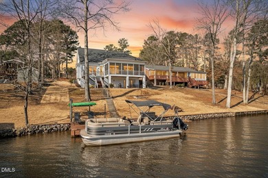 Wake up to breathtaking panoramic lake views from this on River Golf and Country Club at Lake Royale in North Carolina - for sale on GolfHomes.com, golf home, golf lot